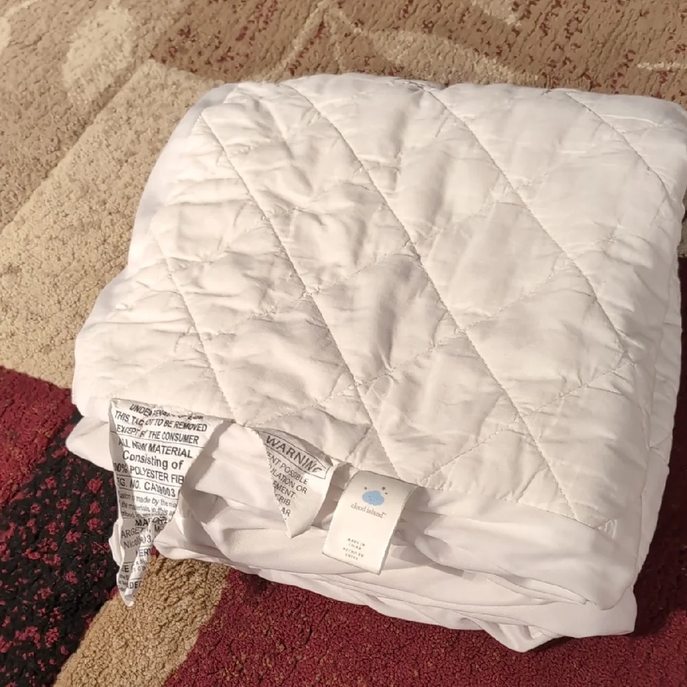 Cloud Island White Crib Quilted Mattress Cover